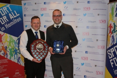 Cllr Hose (right) presents the volunteer of the year award to Gordon Lindsay  of Hamilton Rugby Club